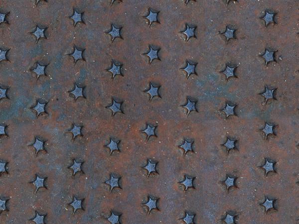 Free seamless rusty metal texture with embossed star pattern