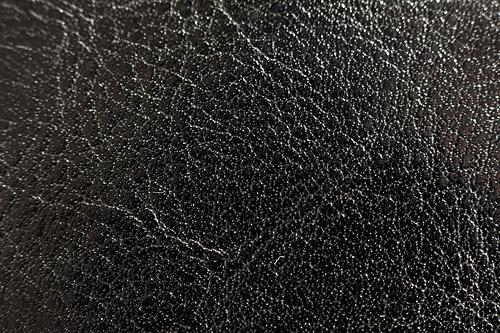 Shiny black leather texture on
                a suitcase by horiavarlan photoshop resource collected by psd-dude.com from flickr