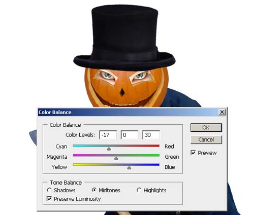 add the hat on the pumpkin and adjust the color balance